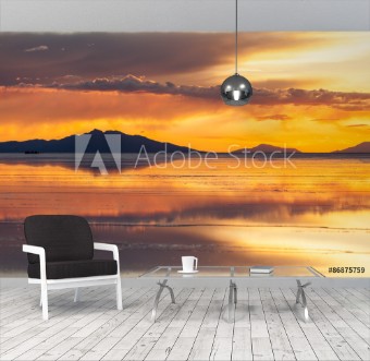 Picture of Tramonto nel Salar de Uyuni Bolivia Nuvole e montagne allorizzonte riflesse sulla superficie bagnata del sale